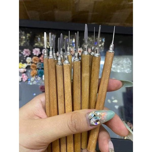 Lấy khoé cán gỗ nail