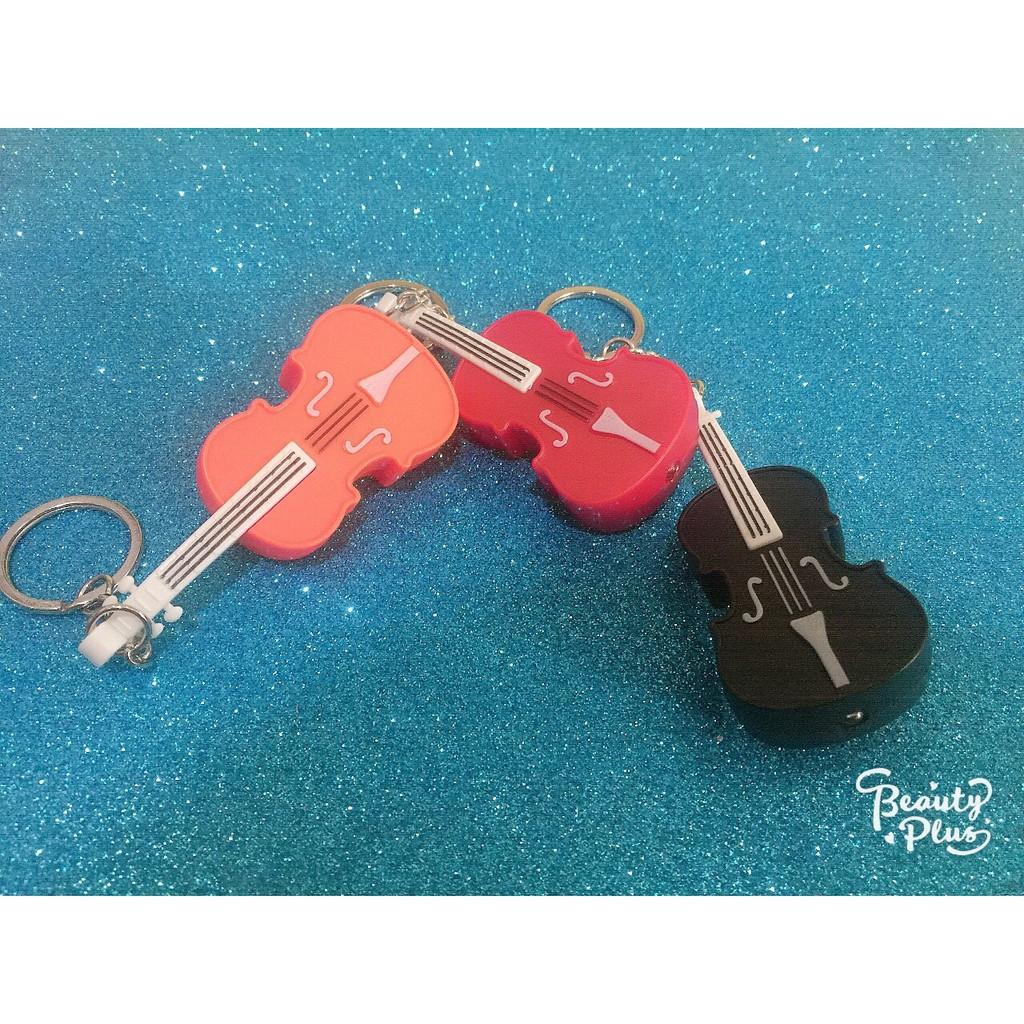 Móc khóa phát sáng hình đàn