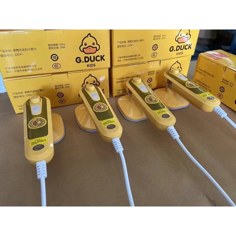 Bàn ủi mini du lịch cầm tay hình con vịt vàng G. DUCK hottrend - Bàn là hơi nước du lịch con vịt vàng mẫu mới 2021.