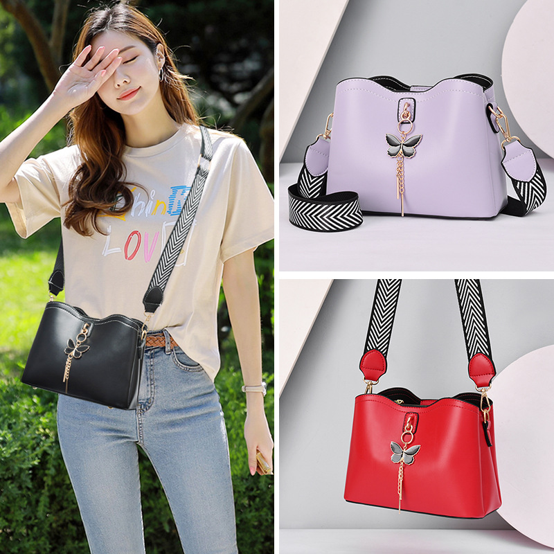 Túi Xách Nữ Da Trơn Phối Móc Khóa Con Bướm Có Dây Đeo Tiện Lợi
