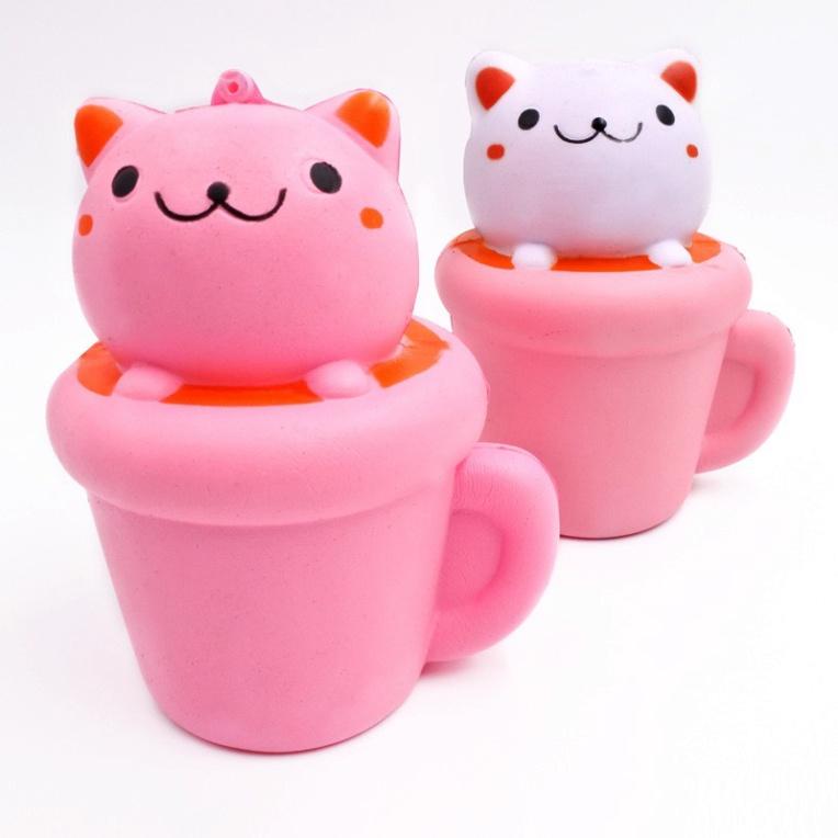 Squishy MÈO HỒNG nằm trong cốc squishy cốc thỏ hồng dễ thương ngộ nghĩnh