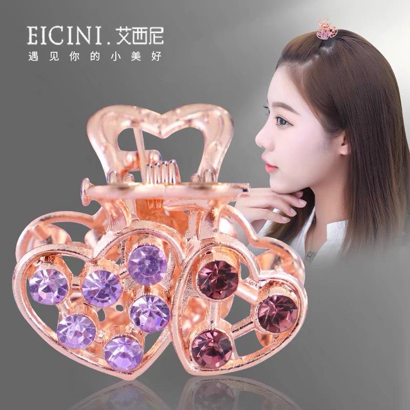 Kẹp ngoạm tóc đánh đá