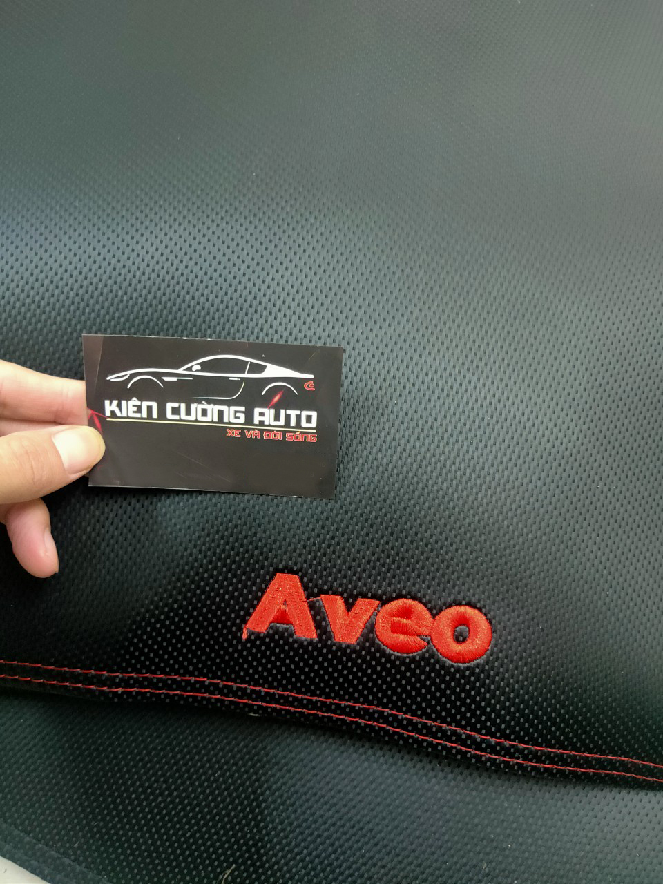 Thảm Taplo Xe Chevrolet Aveo 2011-2018 loại da dày cao cấp 3 lớp chống trượt Da Carbon đen