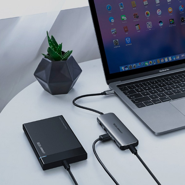 Hub USB Type-C ra 4 cổng USB 3.0 hỗ trợ cổng USB-C cấp nguồn chính hãng Ugreen 50980 cao cấp