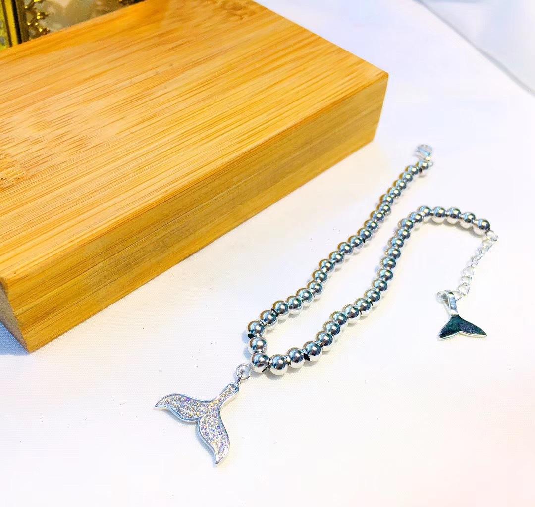 Lắc tay đuôi cá đính đá sang chảnh