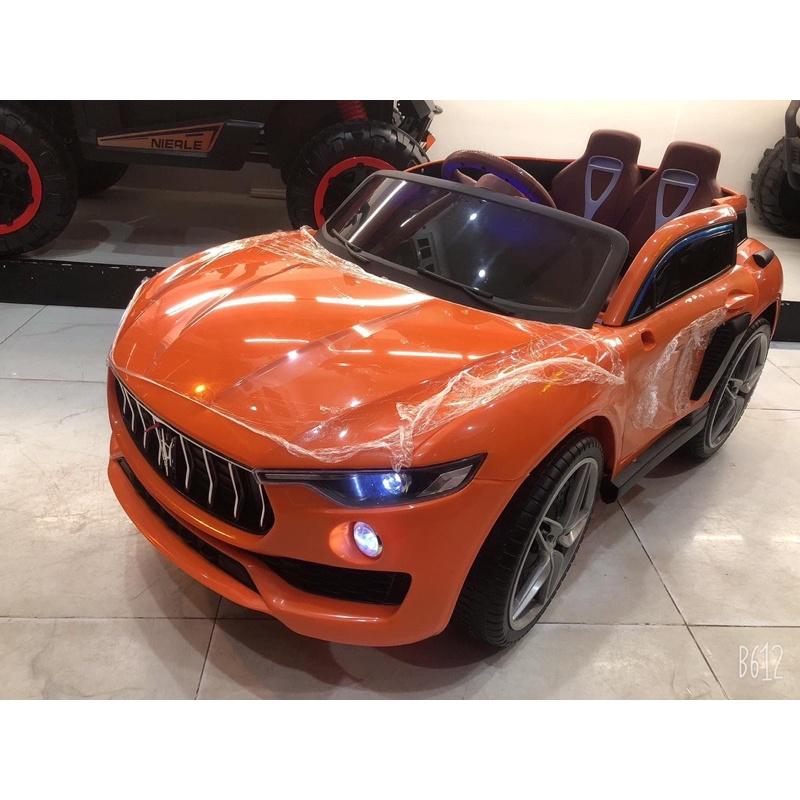 Xe ô tô điện trẻ em cao cấp MASERATI KUPAI-2021 4 động cơ 2 chỗ Bình Ắc Quy 12V7A - DH STORE