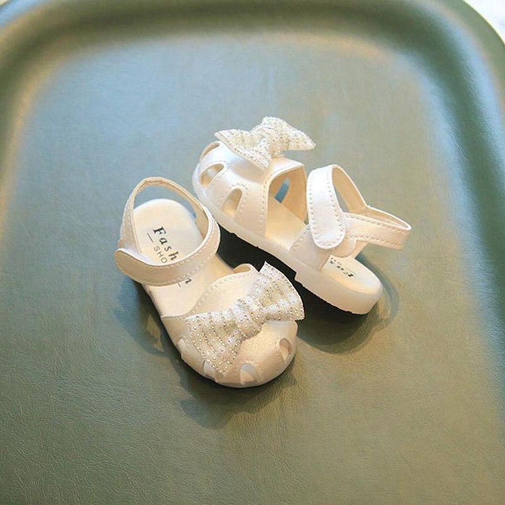 Dép tập đi dành cho bé gái sandal mũi kín đính nơ cho bé 0-2 tuổi
