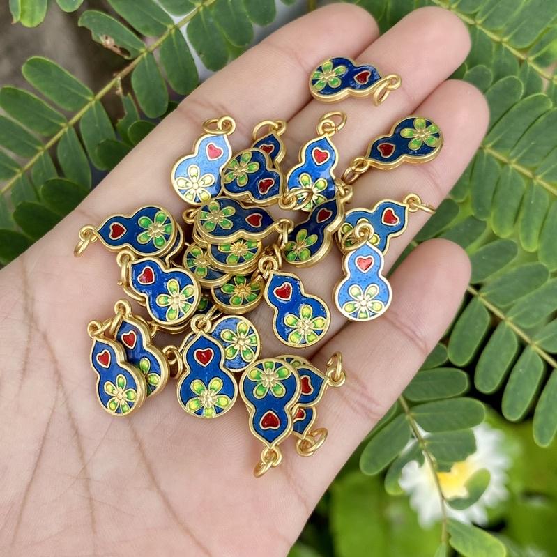 Charm hồ lô vàng mix vòng tay