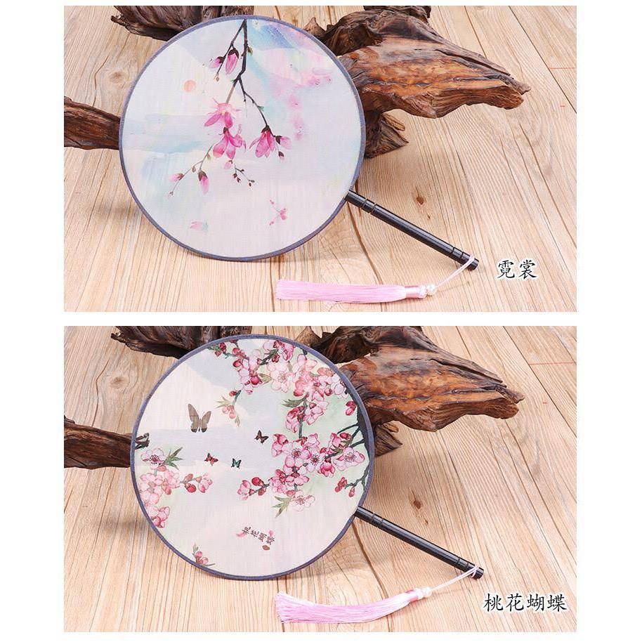 Quạt trong suốt mẫu hoa bỉ ngạn in hai mặt