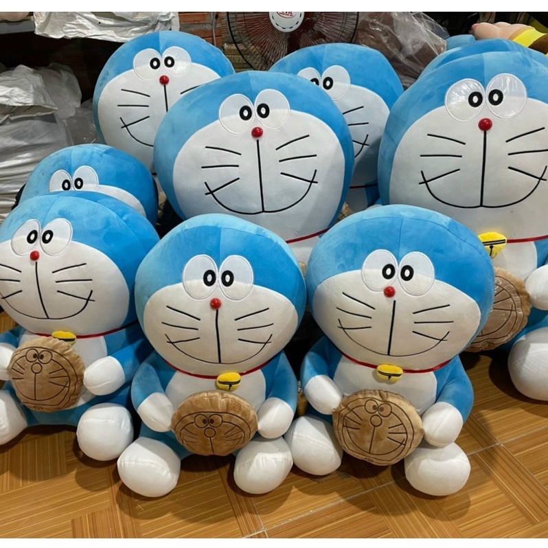 Thú nhồi bông Doraemon ôm bánh rán - Size từ 40cm đến 80cm - Quà tặng gấu bông Doraemon dễ thương