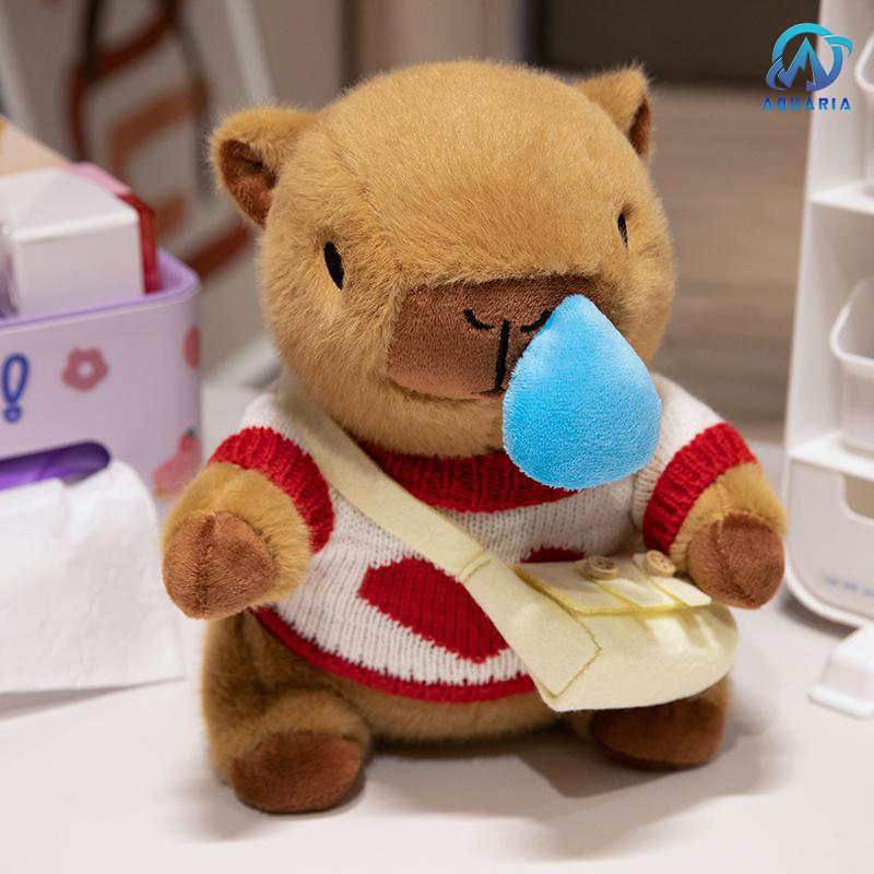 Gấu Bông Thú Nhồi Bông Capybara Mặc Áo Len Đeo Túi Có Thể Kéo Mũi Siêu Đáng Yêu 25cm (Mẫu Áo Len Ngẫu Nhiên)