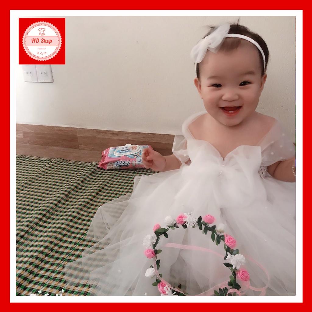 Váy bé gái trắng nơ đính đá