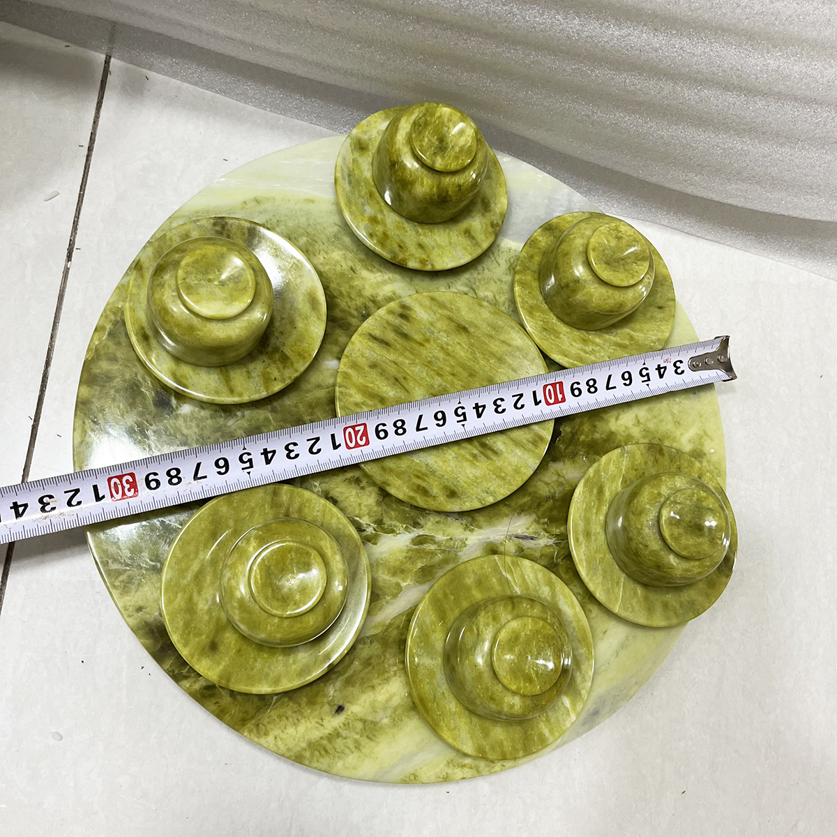 Bộ ấm chén uống nước bằng ngọc serpentine của Việt Nam đường kính khay 32 cm, nặng 5 kg cả bộ