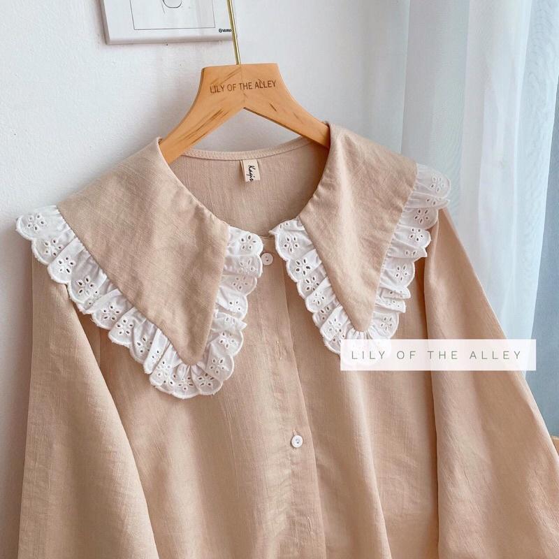 Sơ mi đũi xước cổ búp bê viền ren