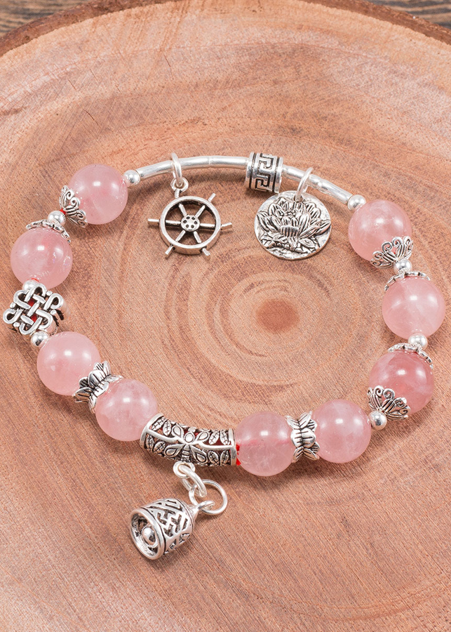 Vòng tay thạch anh hồng phối charm chuông bạc Ngọc Quý Gemstones