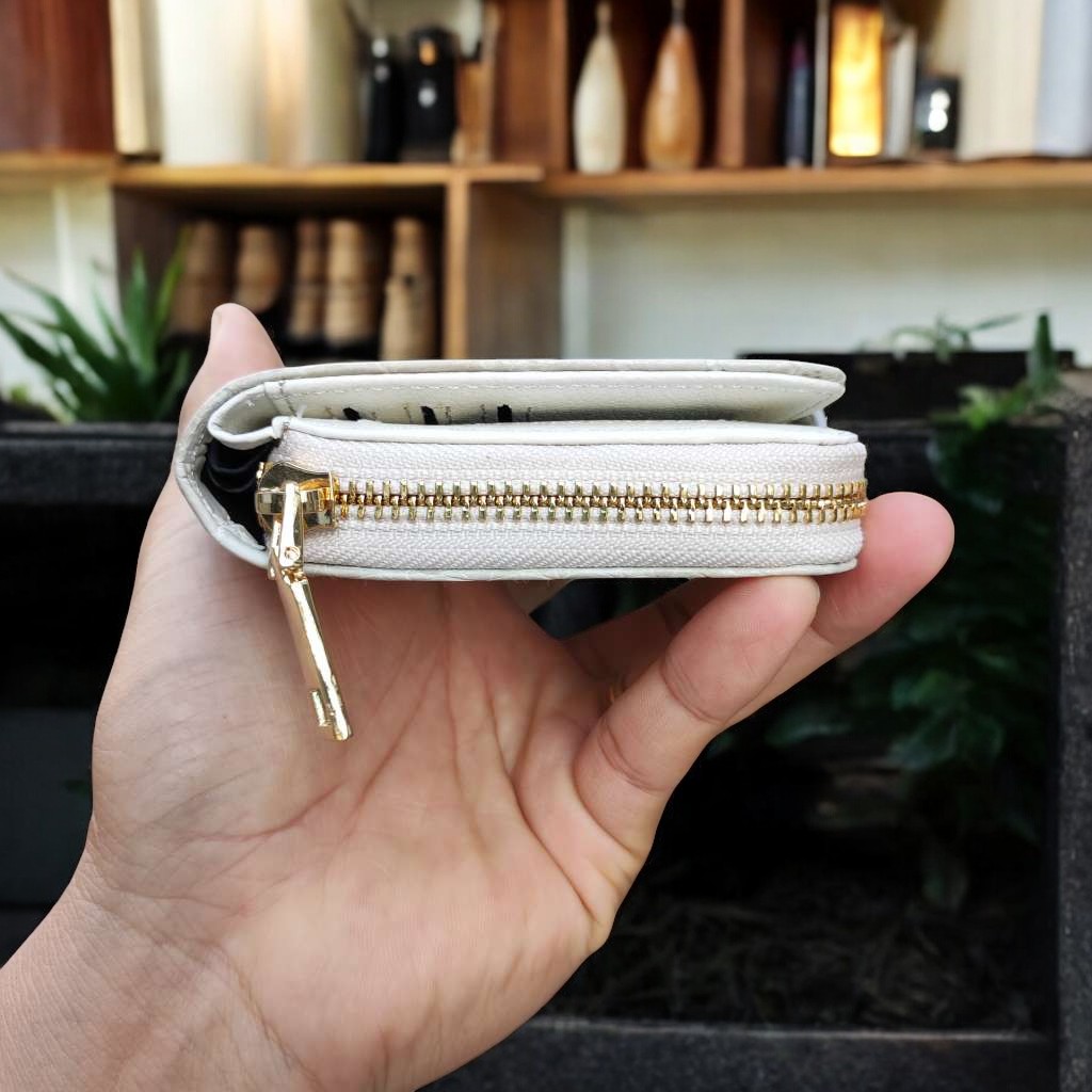 Ví nữ cầm tay nhiều ngăn Da bụng cá sấu bạch tạng!