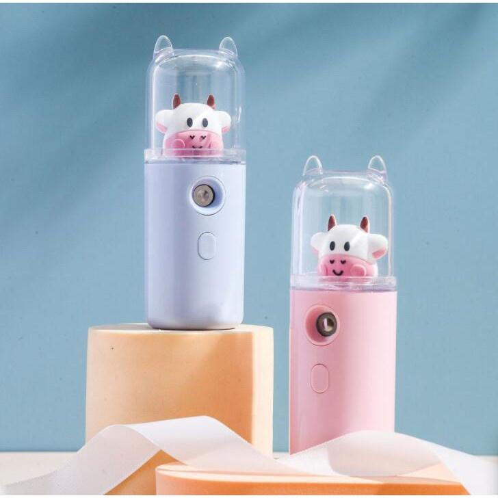 MÁY PHUN SƯƠNG , TẠO ĐỘ ẨM XÔNG HƠI MẶT NANO MINI CẦM TAY HÌNH CHÚ BÒ SỮA ĐÁNG YÊU