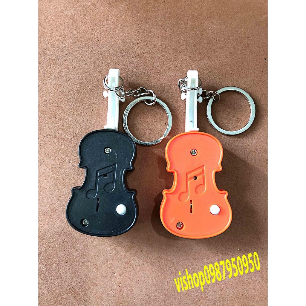 Móc khóa phát sáng hình đàn