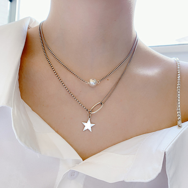 Vòng cổ titan không đen mix sao sành điệu