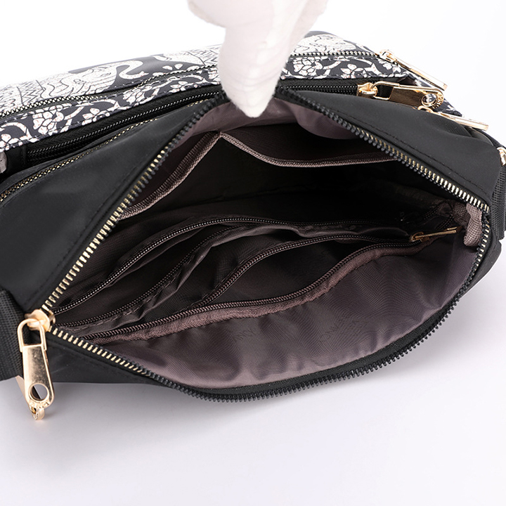 Túi đeo chéo họa tiết nữ, có 7 ngăn tiện lợi chống nước chống mài mòn size 29cm cam kết chất lượng tốt
