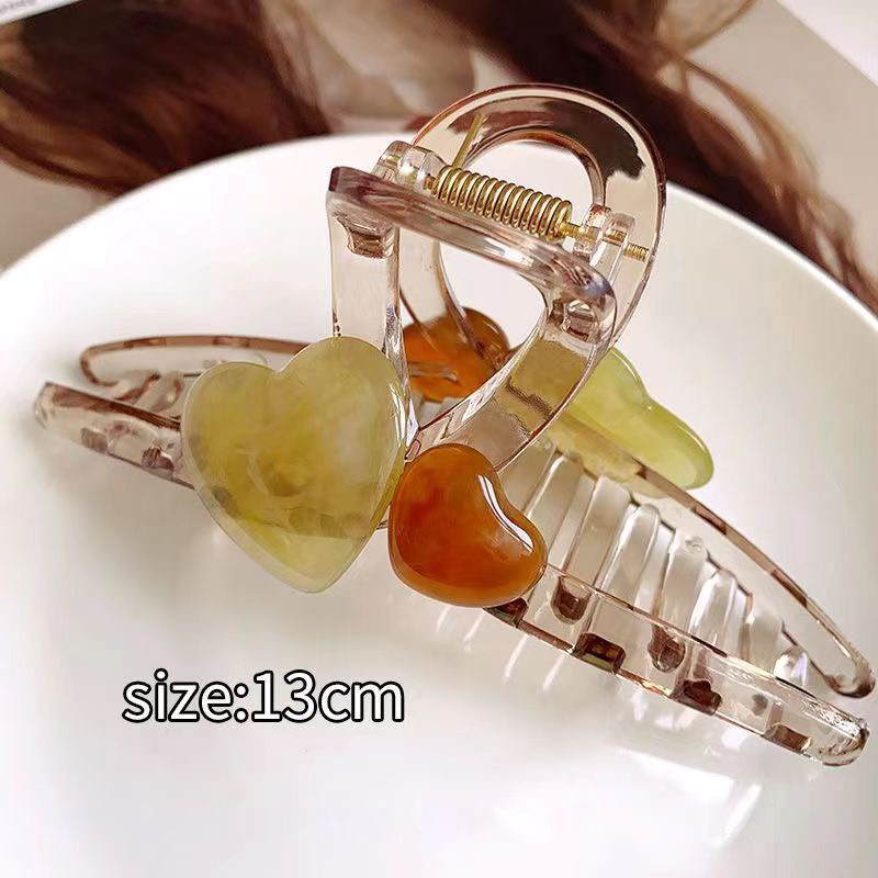 Kẹp tóc càng cua trong suốt đính trái tim