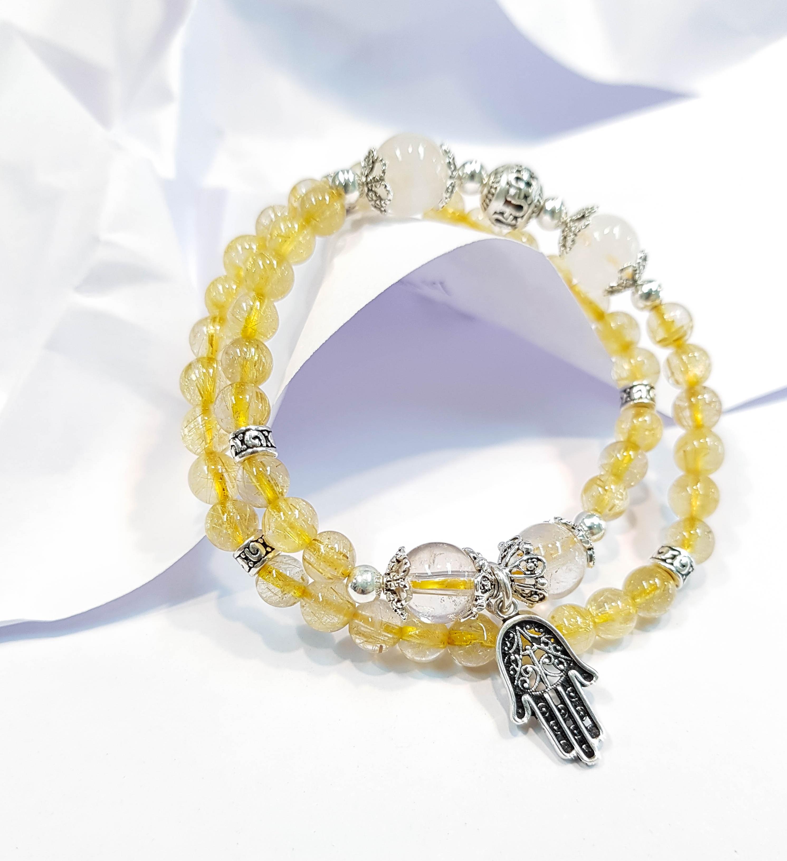 Vòng tay mệnh Kim, thủy đá thạch anh tóc vàng, Thạch anh trắng và charm Hamsa