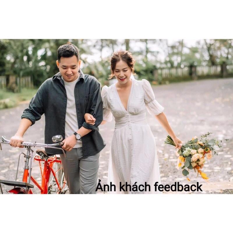 Đầm xốp trắng cổ V nút bọc có size