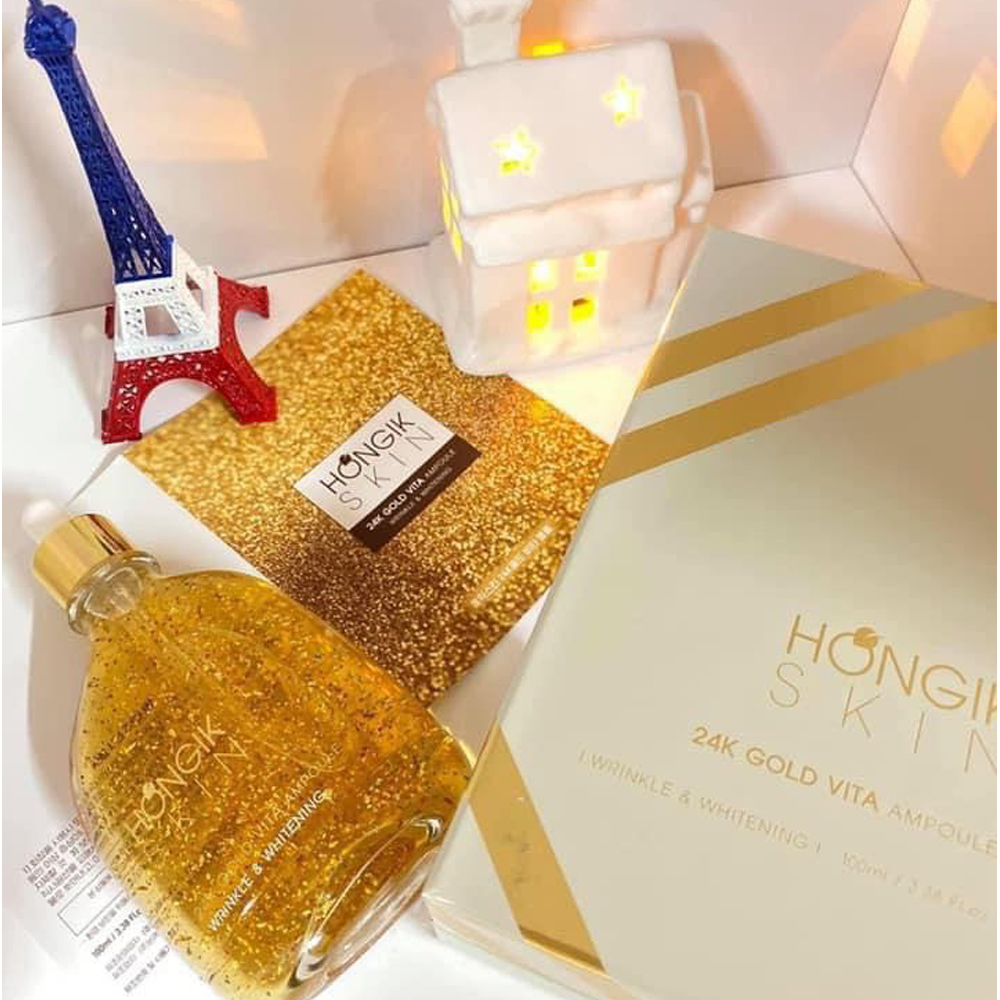 Tinh chất vàng non Hongik Skin 24k Gold Vita Ampoule Wrinkle giúp sản sinh colagen trong da tạo sự đàn hồi cho da.