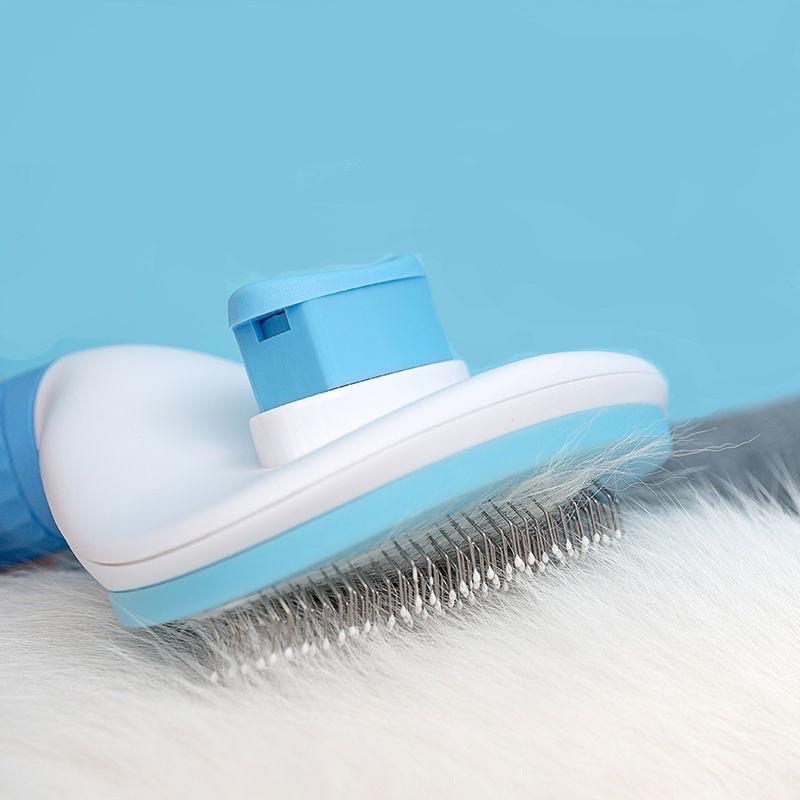 Lược chải lông có nút bấm đẩy lông đầu chải inox lấy lông chó mèo dễ dàng