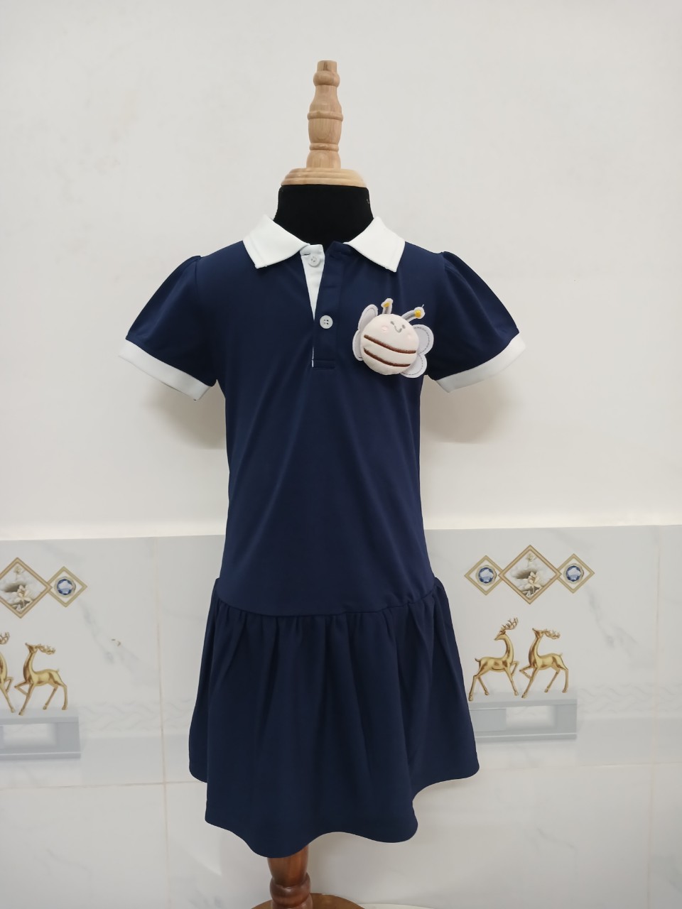 ĐẦM BÉ GÁI POLO XANH NAVY BEE BÈO LAI