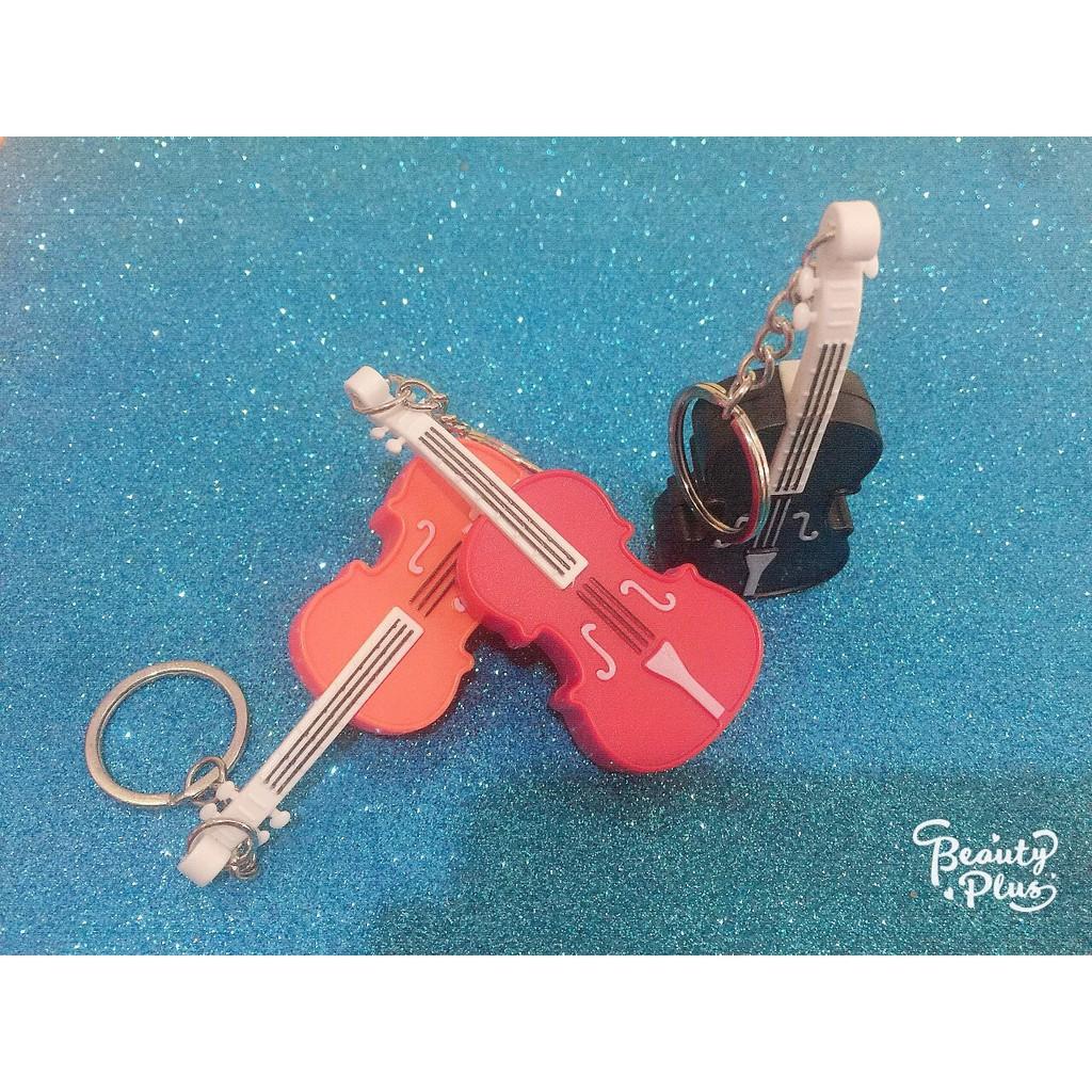 Móc khóa phát sáng hình đàn