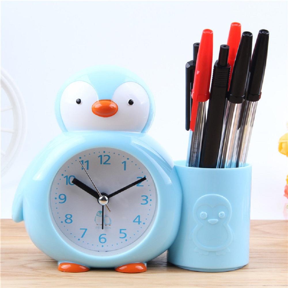 Đồng hồ báo thức để bàn có khay  đựng bút, cắm viết hình động vật chim cánh cụt khủng long