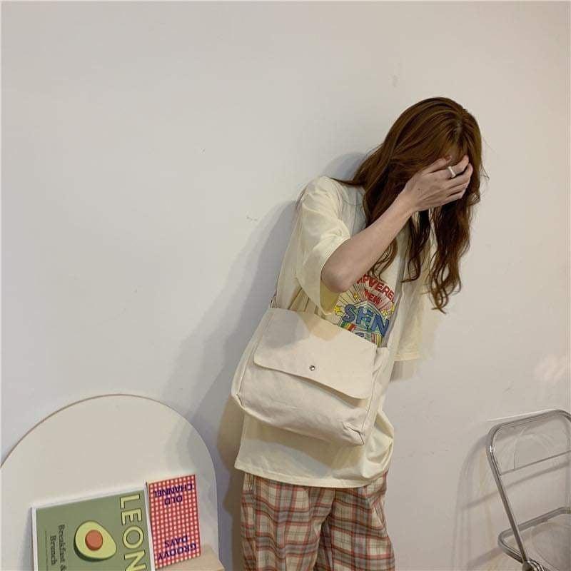 Túi đeo chéo trắng