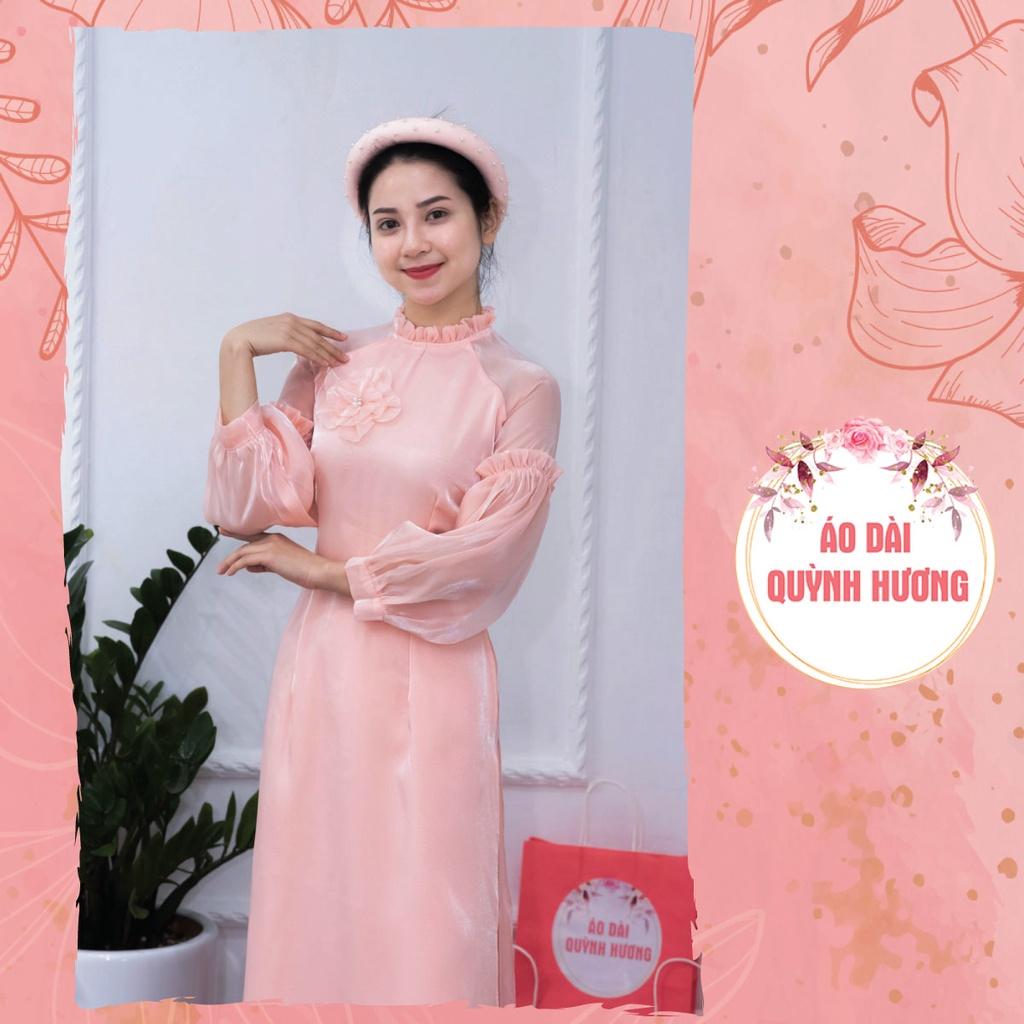 Áo dài voan hồng cam tay bồng chun cách điệu