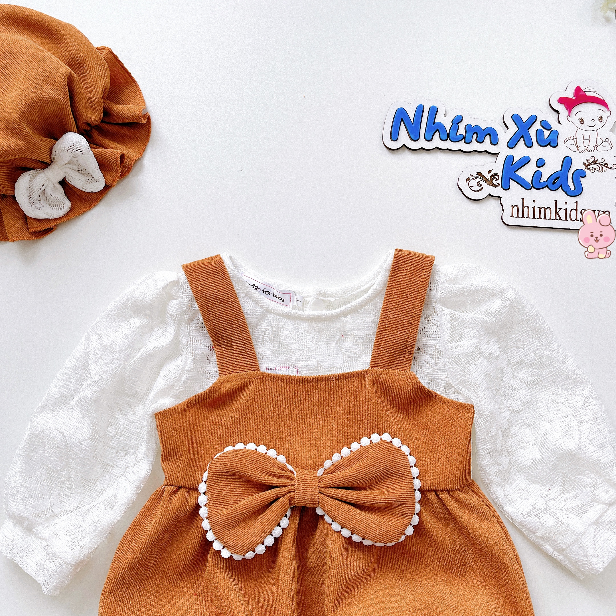 Body Nhung Tăm Nâu Tây Phối Nơ Viền Ren Sang Chảnh Bé Gái 3-12kg