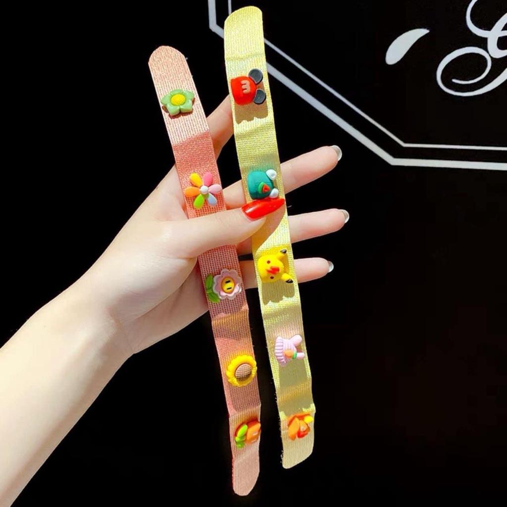 Bờm vải dính gắn icon dễ thương cho bé gái