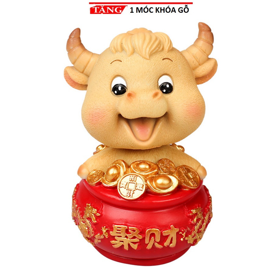 Tượng trâu vàng phong thuỷ trang trí xe hơi