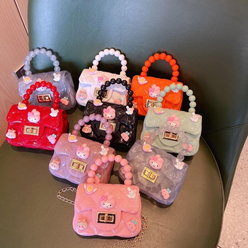 Túi đeo chéo mini cho bé gái, túi xách trẻ em xinh xắn dễ thương nhiều màu chất liệu nhựa dẻo an toàn Xu Xu Kids