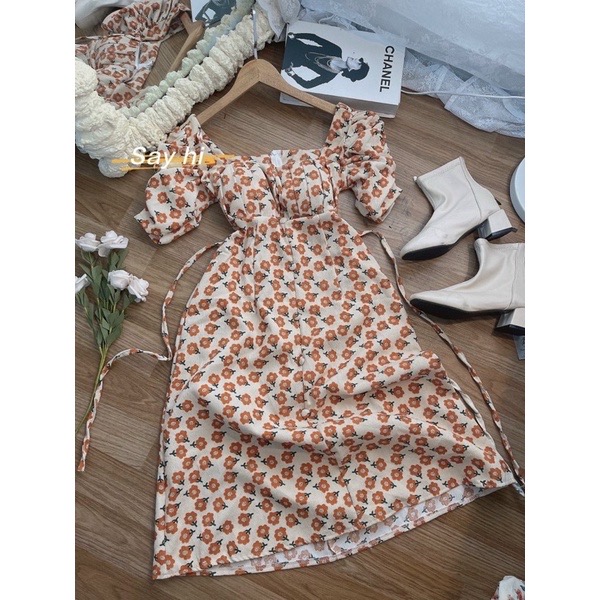 Đầm hoa nhí cổ vuông tay phồng cột nơ lưng tiểu thư