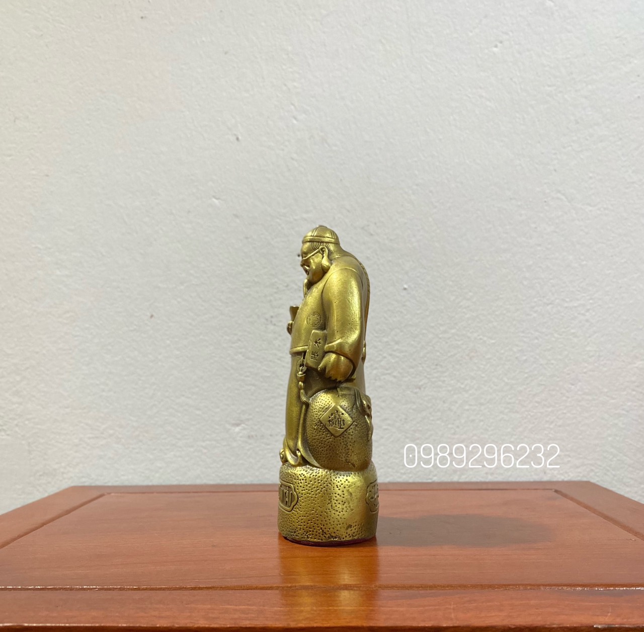 Tượng ông quản gia quản tài bằng đồng thau phong thủy