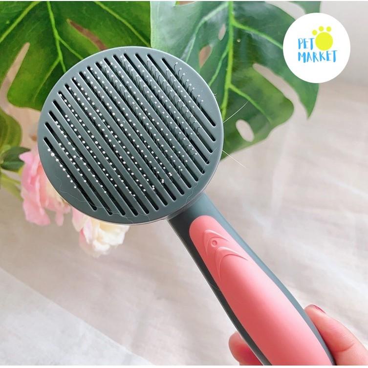 Lược chải lông cao cấp PAKEWAY T9 cho chó mèo. Có nút bấm đẩy lông xịn xò.