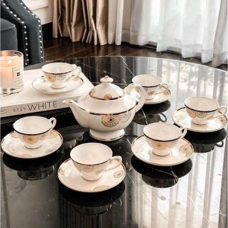 Bộ bình trà hoa đồng tiền sứ