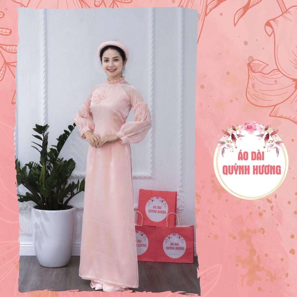 Áo dài voan hồng cam tay bồng chun cách điệu