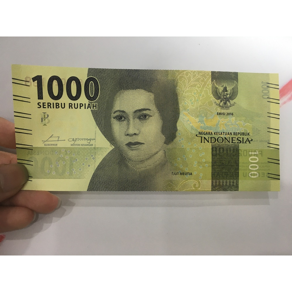 Tiền 1000 Rupiah của Indonesia màu xanh lá, tặng phơi nylon bảo quản tiền