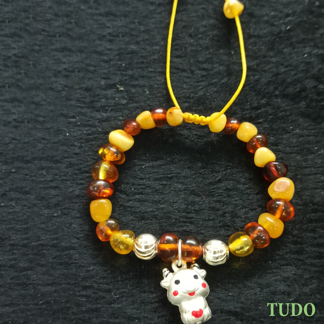 Vòng tay TUDO hổ phách tự nhiên mix charm bạc sửu và bi bạc 925
