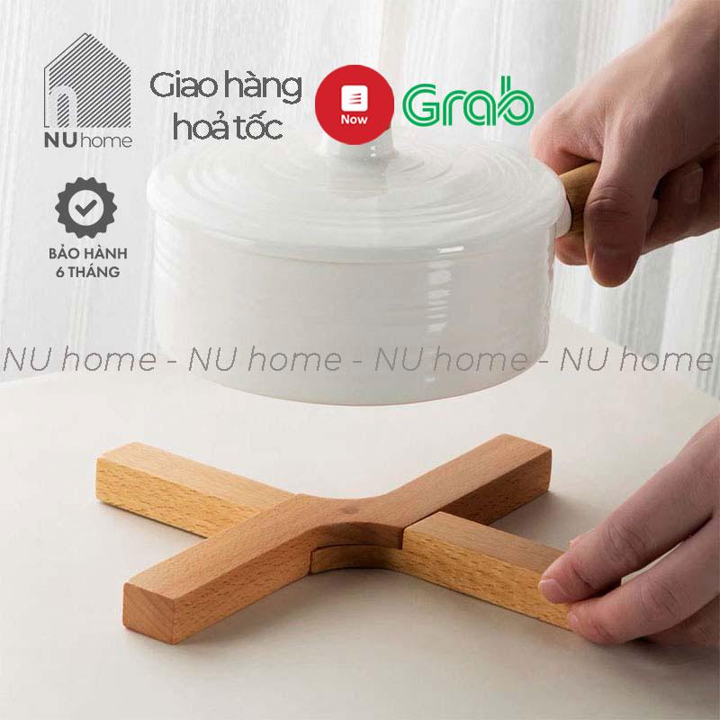 Đế lót nồi chữ X thiết kế đơn giản, phong cách mộc mạc với chất liệu bằng gỗ tự nhiên chiụ được nhiệt độ cao