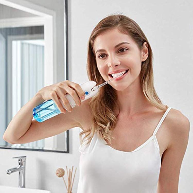MÁY TĂM NƯỚC ORAL IRRIGATOR DU LỊCH, TẶNG TÚI ĐỰNG.