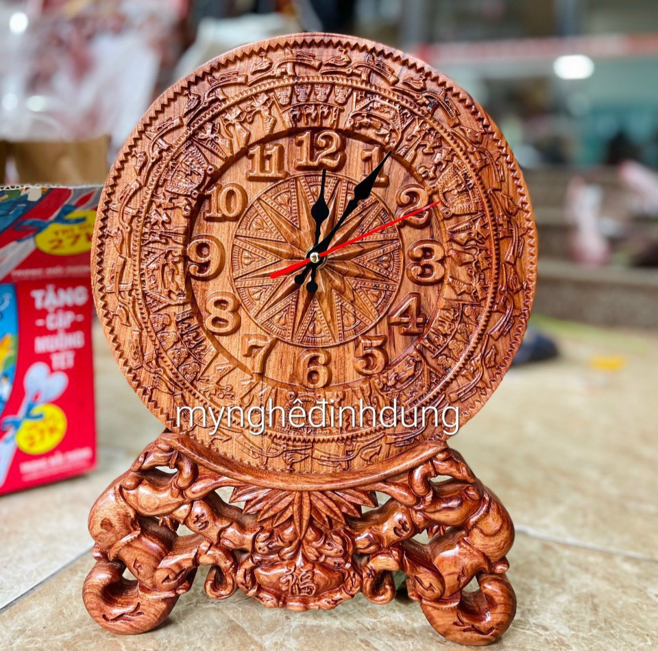 Tranh đồng hồ khắc trống đồng đông sơn trang trí phòng khách bằng gỗ hương đá kt mặt tròn 27×3×37cm