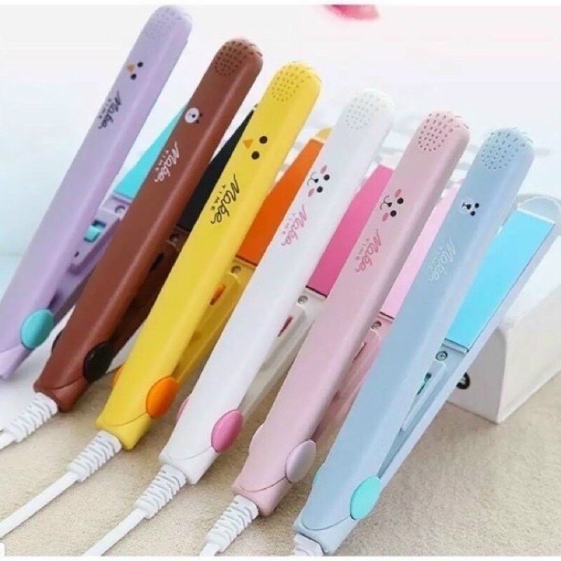 Máy duỗi tóc mini có hộp ,máy ép tóc cầm tay , nhỏ gọn tiện lợi khi đi du lịch rất tiện lợi