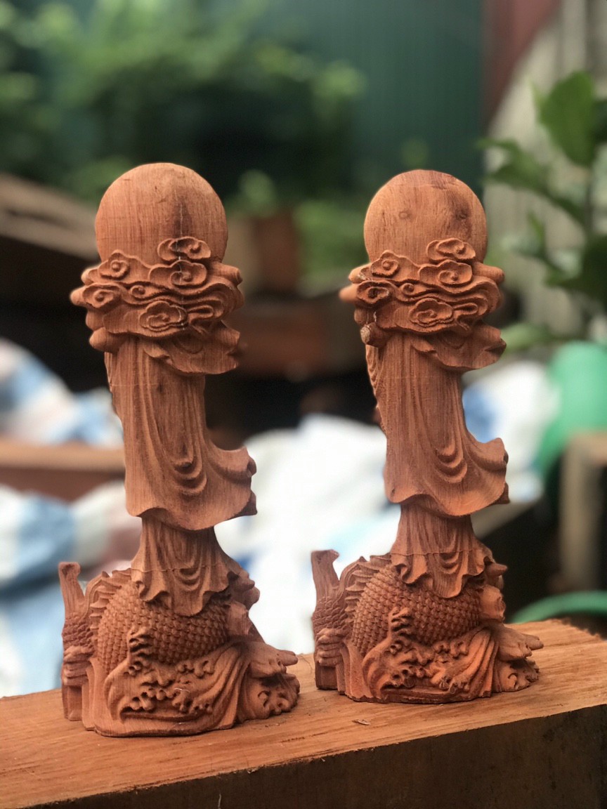 Tượng phật bà cưỡi cá chép bằng gỗ hương đá